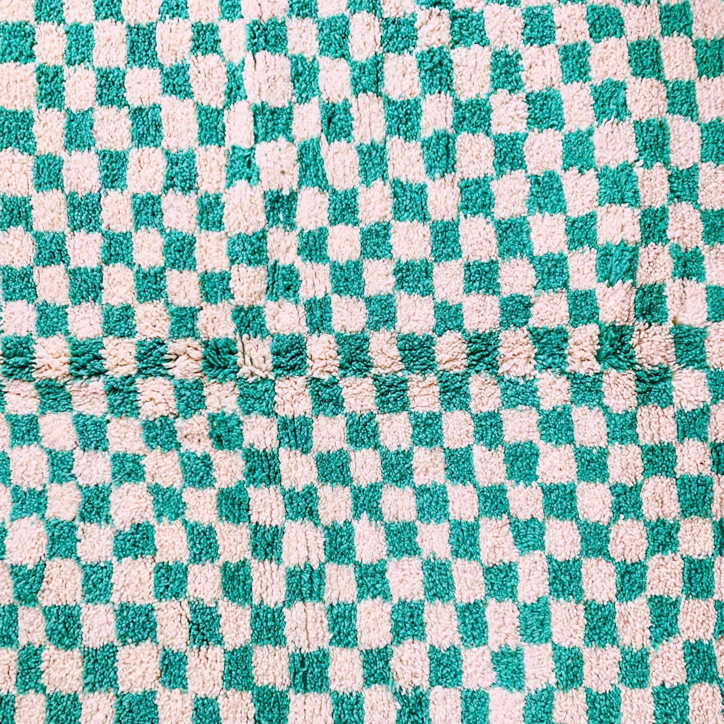 Green-and-white-checkered-rug